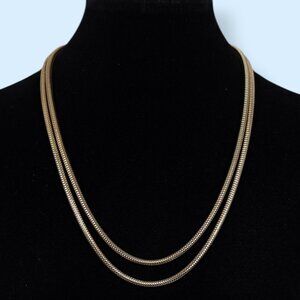 V. Gold Tone Snake Chain